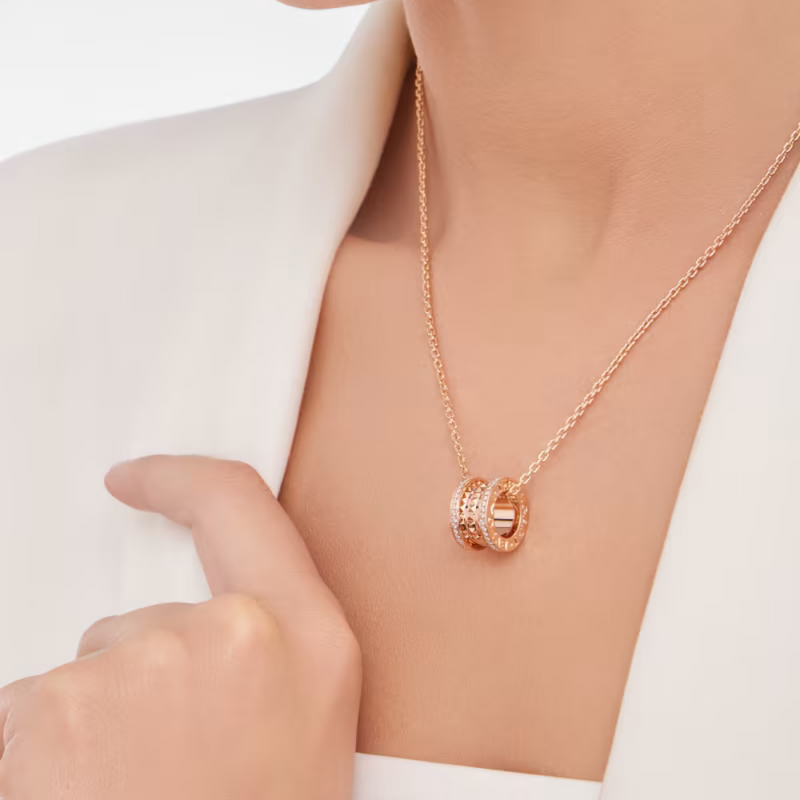 B.zero1 Rock necklace with 18 kt  gold plated pendant with studded spiral, pavé diamonds on the edges